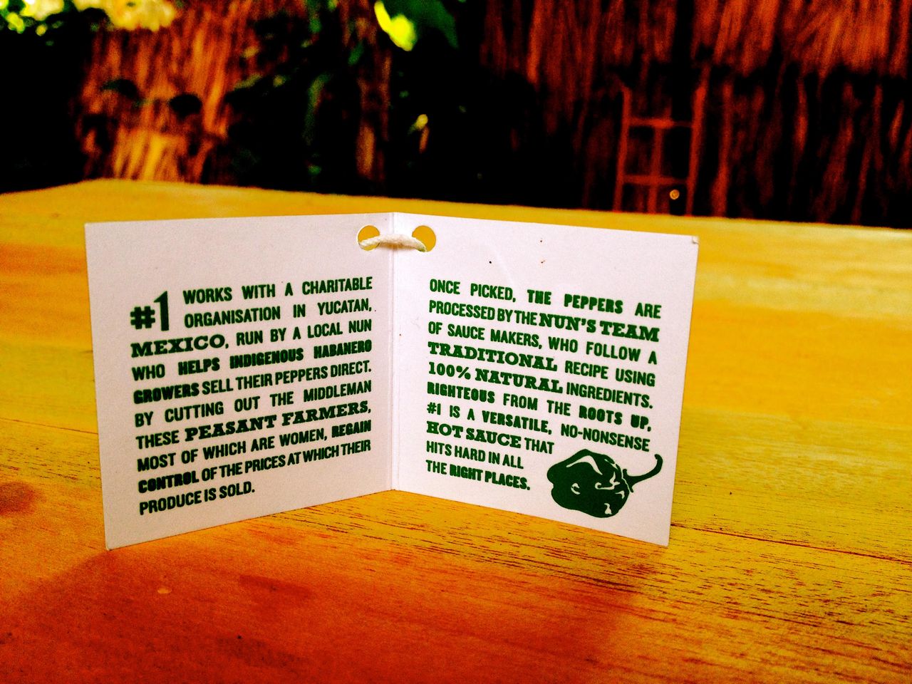 #1 Sauce swing tag telling the story of the Mexican nun and local growers in Yucatán